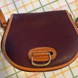 Dooney and Bourke all weather 2 duck Crossbody bag